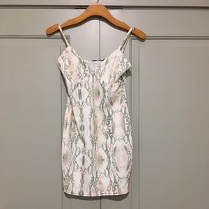 Snake print mini dress. NWT.